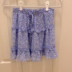 Light blue skirt with white floral design